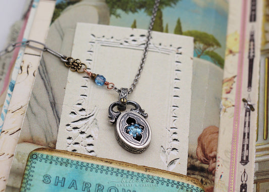 Corinne, Blue Topaz Sterling Shadowbox Necklace